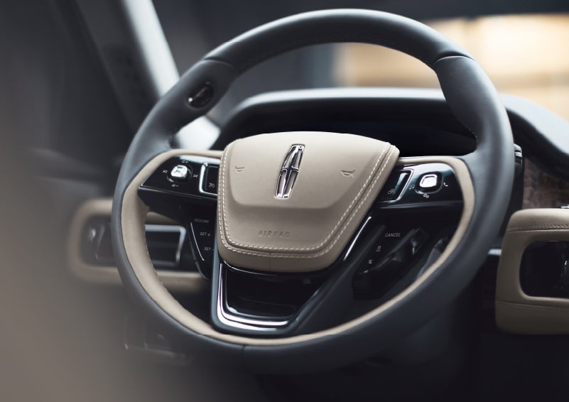 The intuitively placed controls of the steering wheel on a 2024 Lincoln Aviator® SUV | Rogers Lincoln in Midland TX