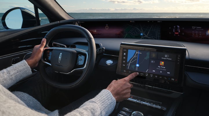 The driver of a 2024 Lincoln Nautilus® SUV interacts with the new Lincoln Digital Experience. | Rogers Lincoln in Midland TX