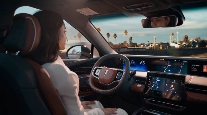 A person is shown driving hands-free on the highway with available Lincoln BlueCruise technology. | Rogers Lincoln in Midland TX