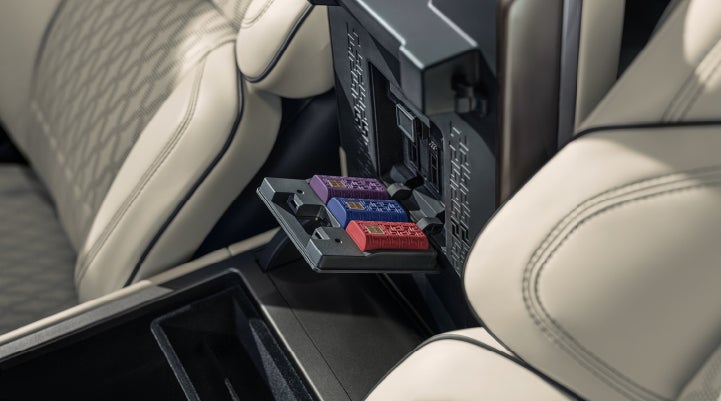 Digital Scent cartridges are shown in the diffuser located in the center arm rest. | Rogers Lincoln in Midland TX